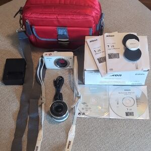 Nikon White Camera with Accessories